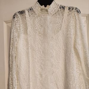 White lace long sleeve top with camisole. NWOT